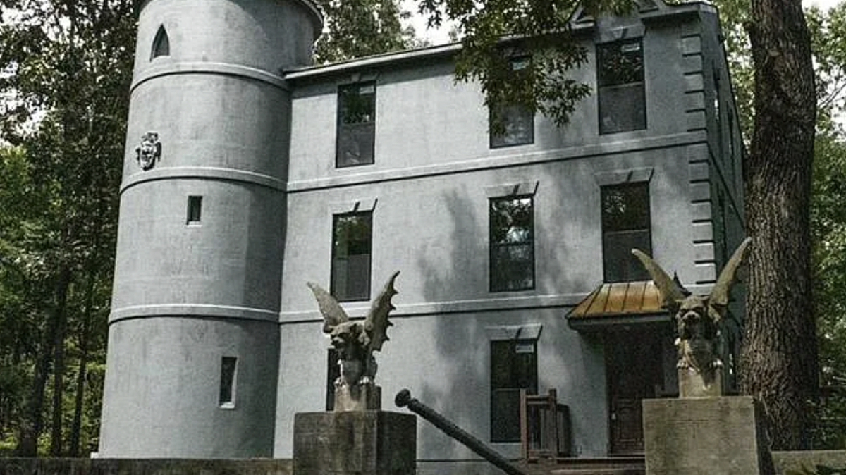 A Walhalla, SC, storybook home with a tower, gargoyles and sword in a stone carries a $525,000 asking price.
