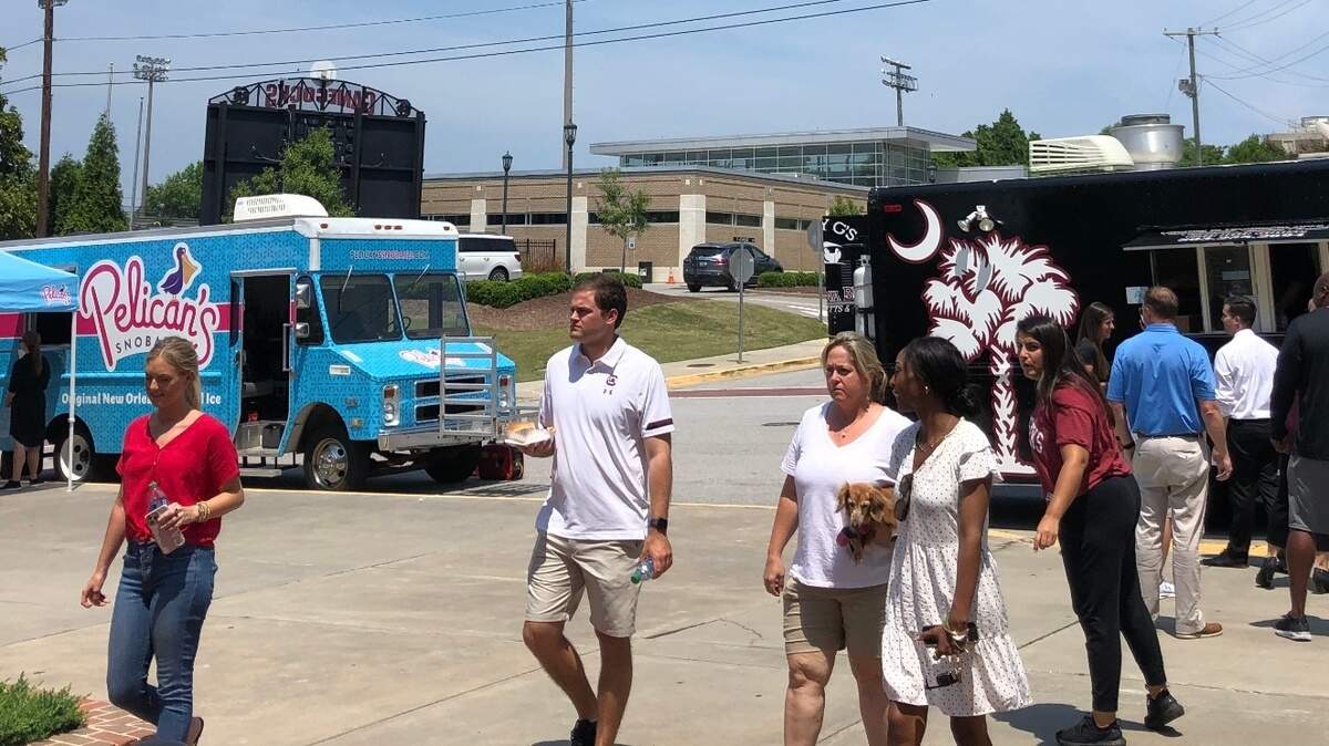 South Carolina AD Ray Tanner helped organize a slew of food trucks for a celebratory lunch for USC athletic department staffers Monday.