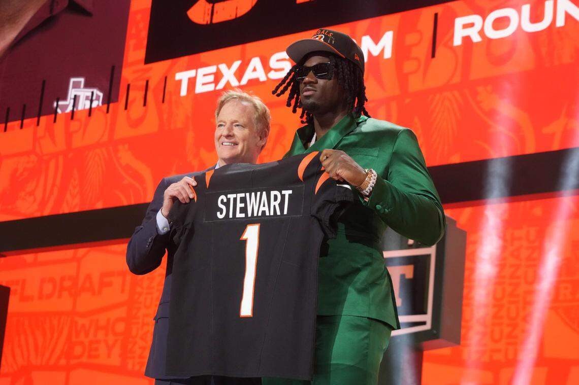 Apr 24, 2025; Green Bay, WI, USA; NFL commissioner Roger Goodell with Texas A&M Aggies defensive end Shemar Stewart after her is selected by the Cincinnati Bengals as the number seventeen pick in the first round of the 2025 NFL Draft at Lambeau Field. Mandatory Credit: Kirby Lee-Imagn Images