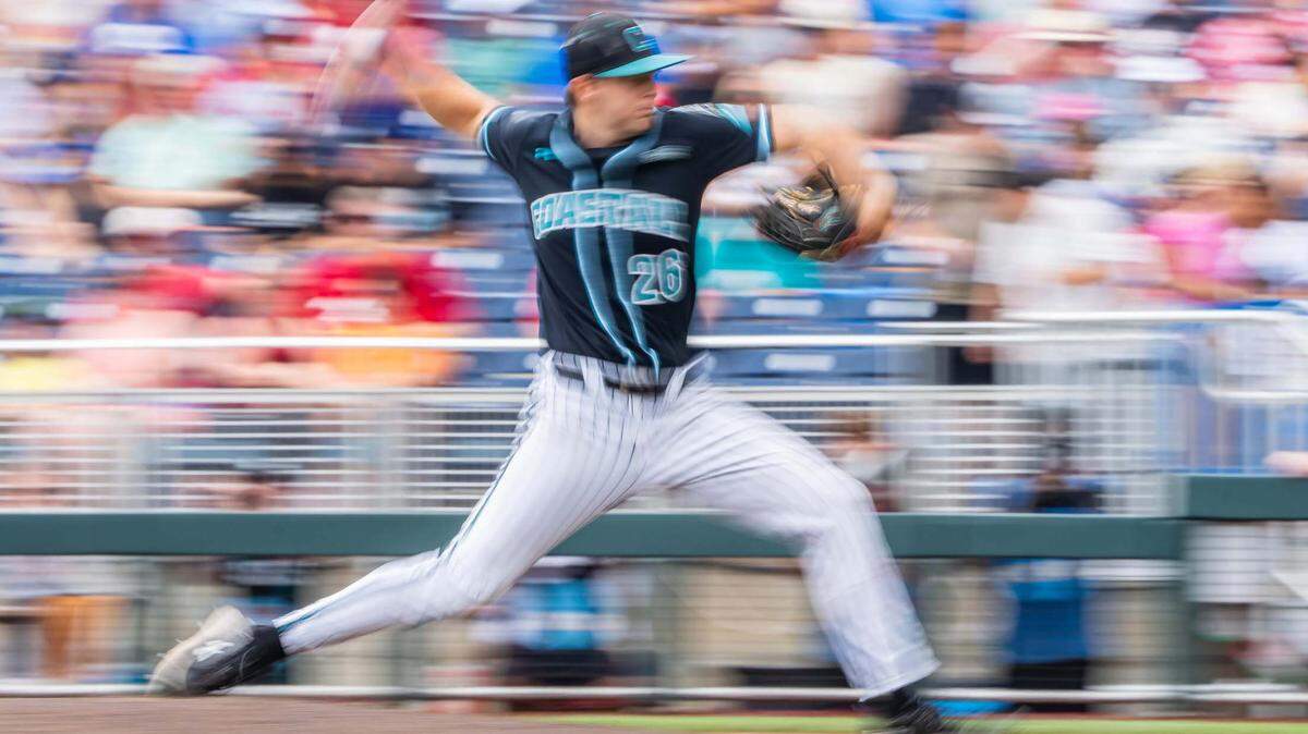 Coastal Carolina Chanticleers starting pitcher Riley Eikhoff (26) pitches against the Louisville Cardinals during the fourth inning at Charles Schwab Field.