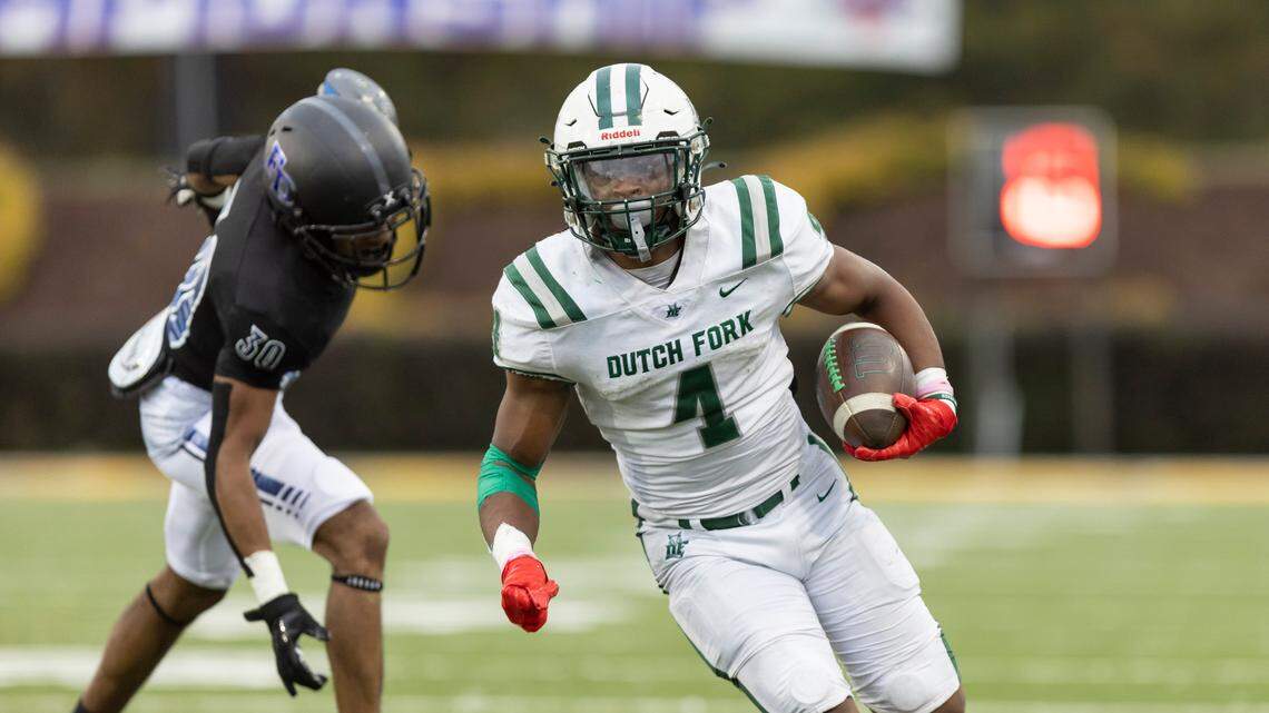 Jarvis Green (4) of Dutch Fork carries the ball during the SCHSL Class 5A Football State Championship at Charles W.Johnson Stadium in Columbia, SC on Saturday, Dec. 3, 2022.