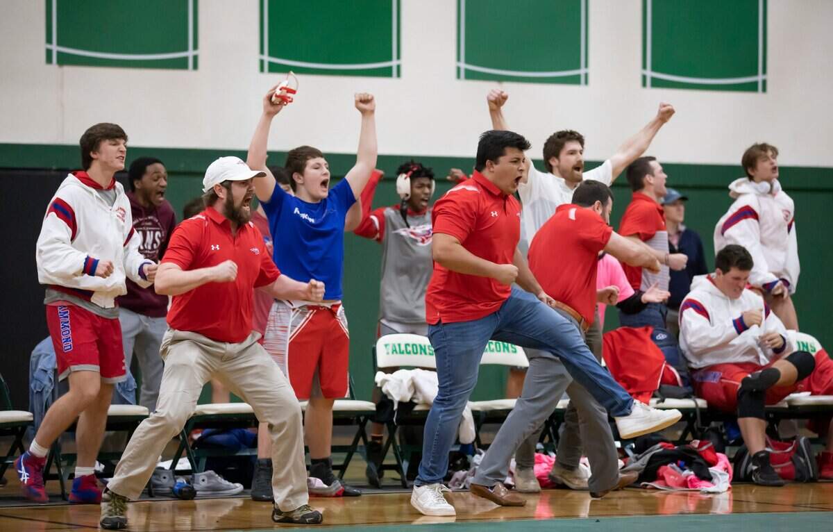 Members of the Hammond School wrestling team celebrate during a match against Ben Lippen during the SCISA 2022 Duals State Wrestling Tournament at Ben Lippen on Saturday, February 5, 2022.