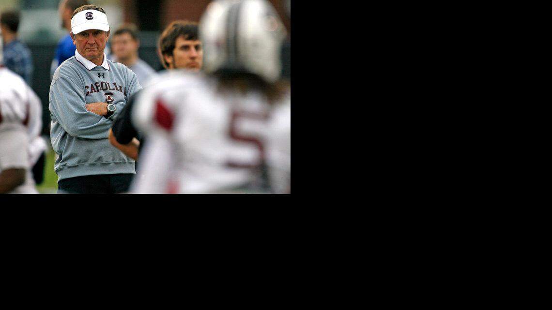 USC head football coach Steve Spurrier watches as the Gamecocks run through drills during practice.