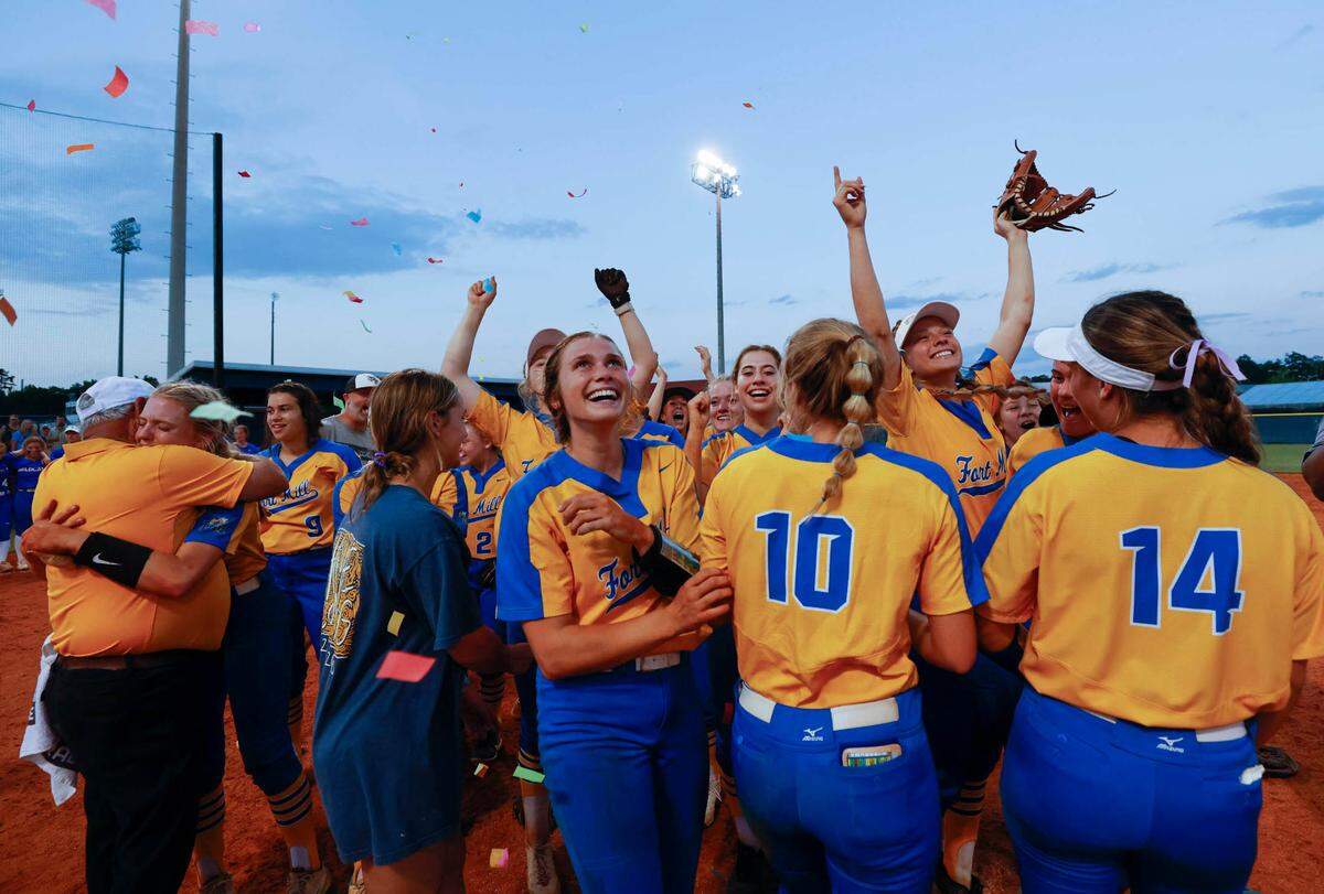 Fort Mill softball players celebrate winning class 5A softball championship against Lexington at Blythewood High on Friday, May 27, 2022.