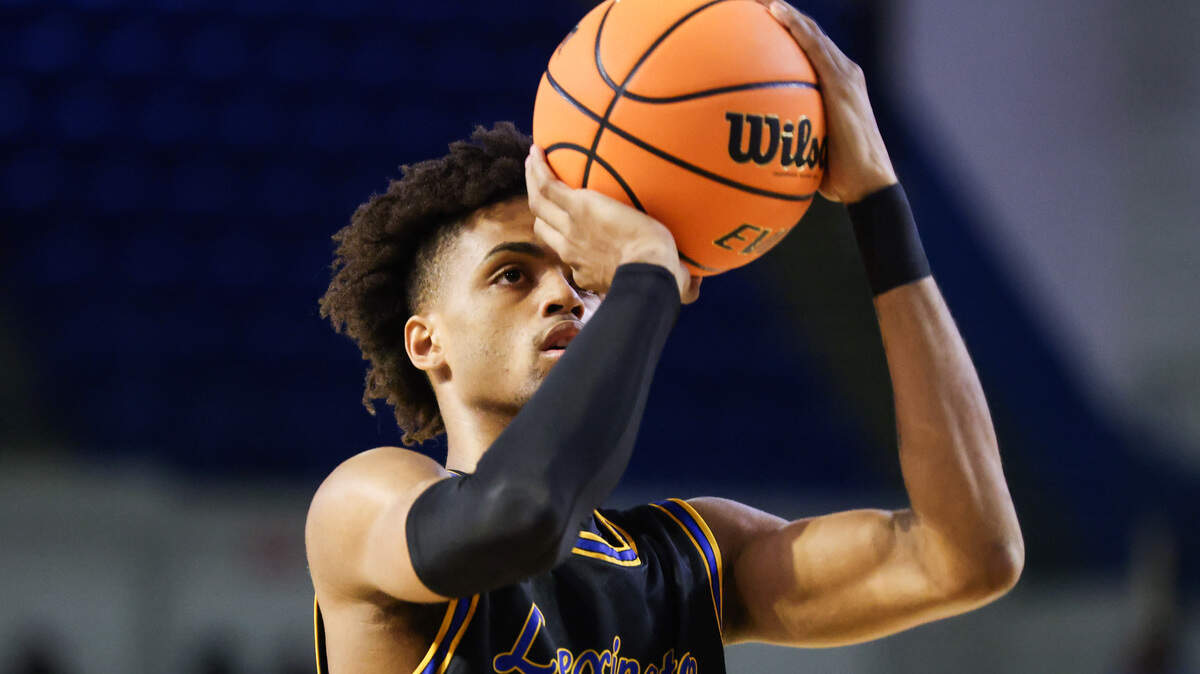 Cameron Scott (23) of Lexington shoots a free-throw during the first half of Lexington’s game against James F. Byrnes in the SCHSL 5A Boys Basketball State Final at the Florence Center on Friday, March 1, 2024.