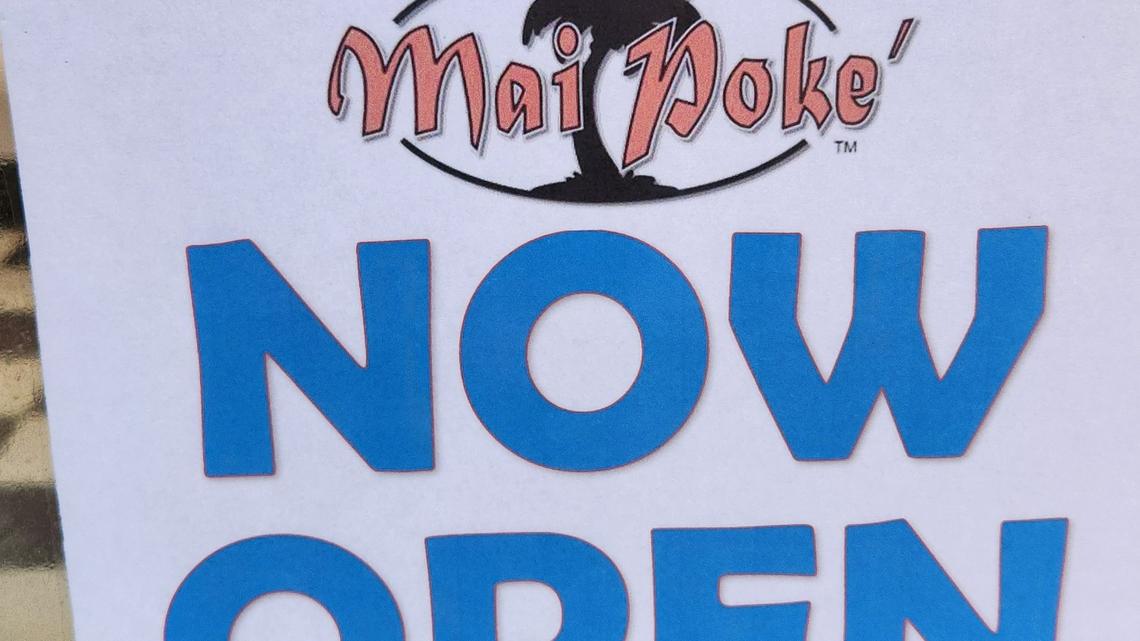 A sign at 1426 Main Street in Columbia touts that Mai Poke is now open.