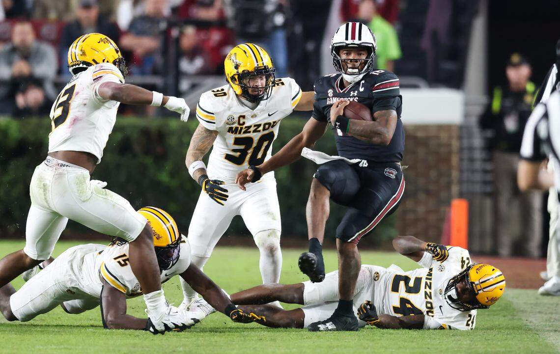 South Carolina quarterback LaNorris Sellers (16) breaks through tackles to get out of bounds during the Gamecocks’ game against Missouri at Williams-Brice Stadium in Columbia on Saturday, November 16, 2024.