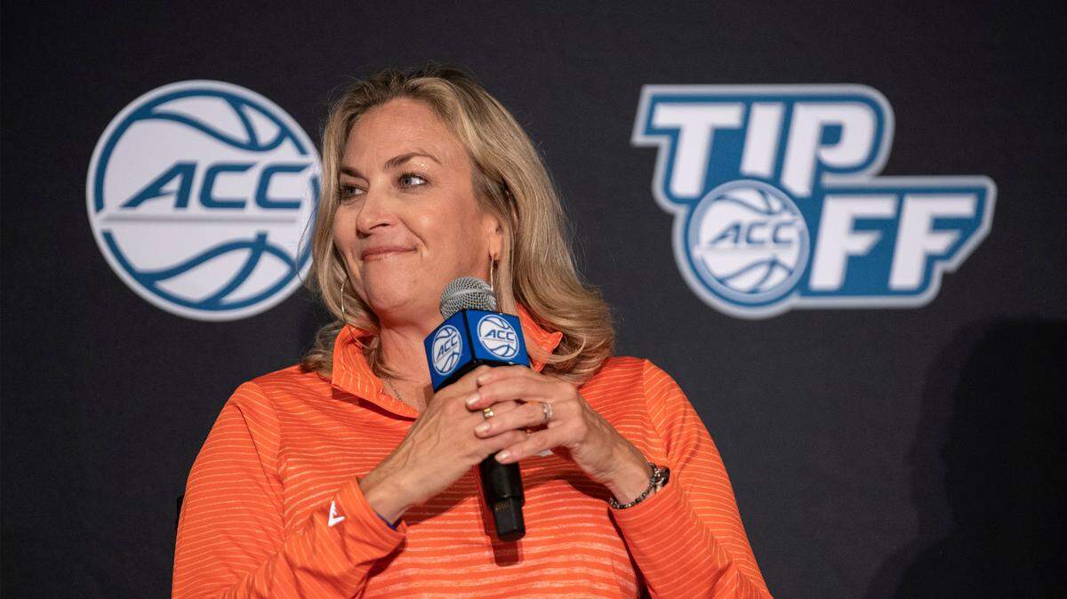 Clemson head coach Amanda Butler smiles during NCAA college basketball Atlantic Coast Conference media day, Wednesday, Oct. 13, 2021, in Charlotte, N.C. (AP Photo/Matt Kelley)