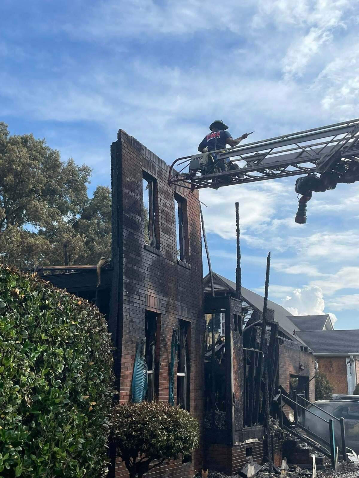 Members of the Columbia Fire Department respond to burning buildings.