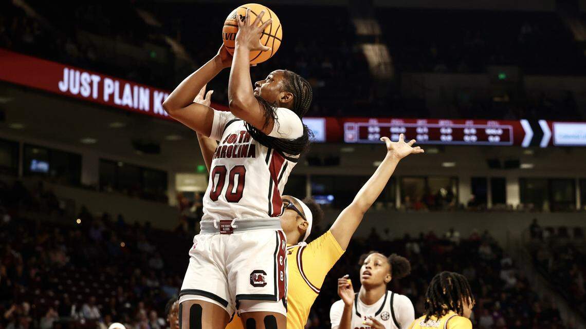 South Carolina’s Ta’Niya Latson (00) shoots as Winthrop’s Mya Pierfax (13) pressures during the first half of their women’s basketball game at Colonial Life Arena on Wednesday Nov. 19, 2025.