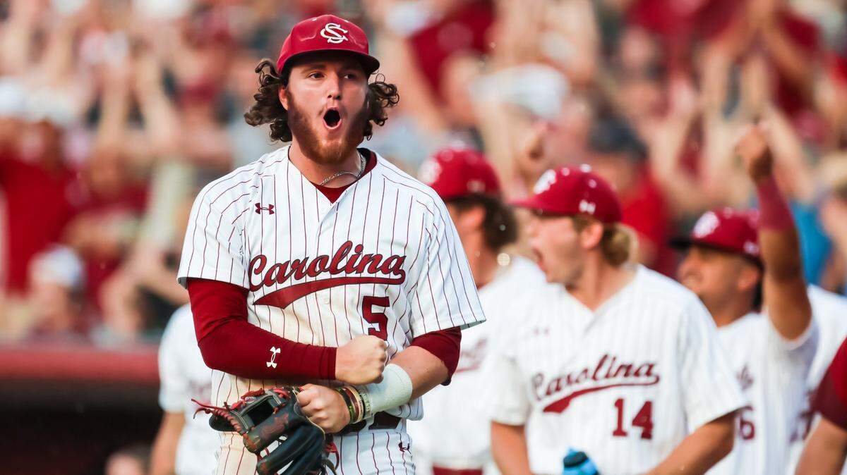South Carolina Gamecocks catcher Talmadge LeCroy (5) reacts to a home run by teammate Will McGillis (6) against the Central Conn. St. Blue Devils during their 2023 NCAA Columbia Regional game at Founders Park in Columbia, SC, Friday, June 2, 2023.