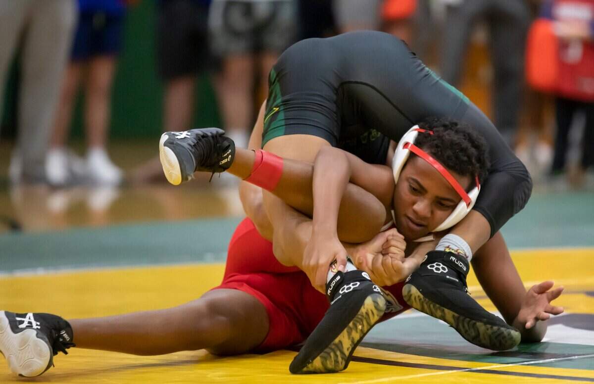 Reese Carson of Ben Lippen wraps up Angesom Ladd of the Hammond School during the SCISA 2022 Duals State Wrestling Tournament at Ben Lippen on Saturday, February 5, 2022.