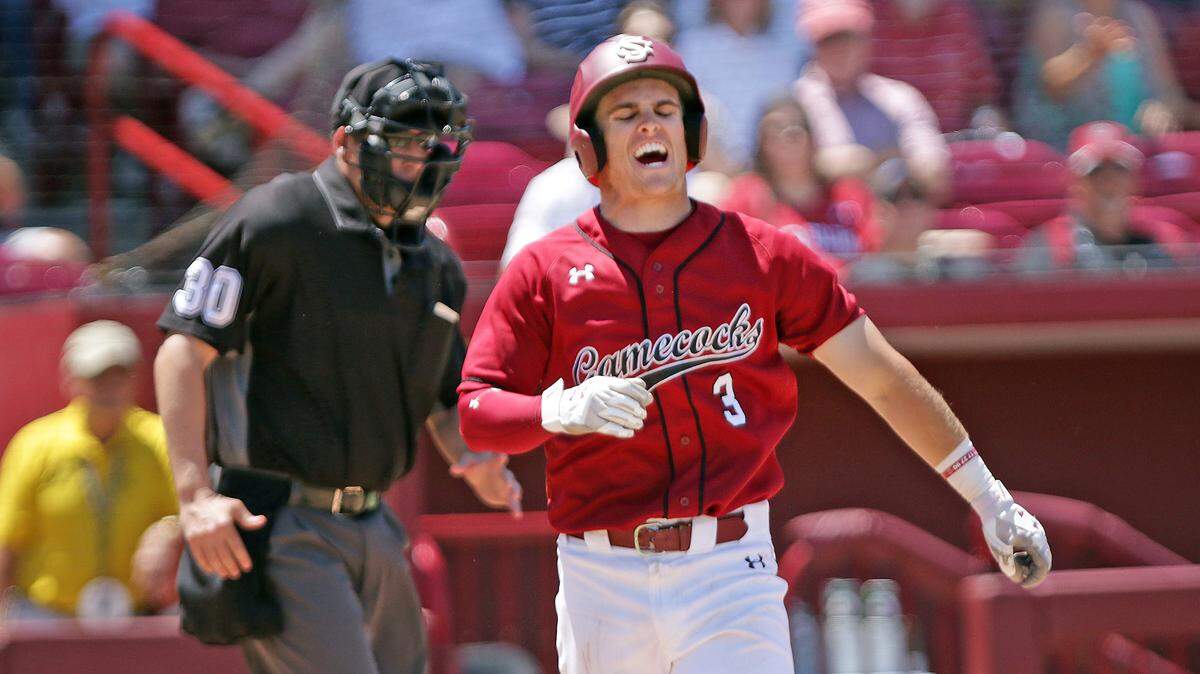 South Carolina baseball's Justin Row reacts after being hit by a pitch in the fifth inning Sunday against Ole Miss at Founders Park.