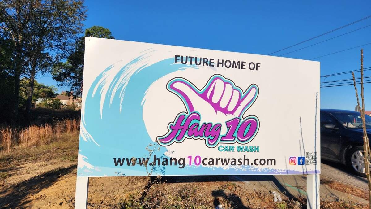 A sign in the 4400 block of Augusta Road in Lexington County touts a coming Hang 10 Car Wash location.