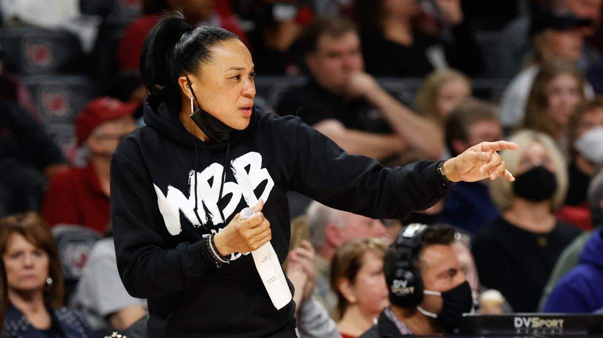 University of South Carolina Head Coach Dawn Staley communicates to her team during the match-up against Kentucky on Sunday, Jan. 9, 2022 in the Colonial Life Arena.