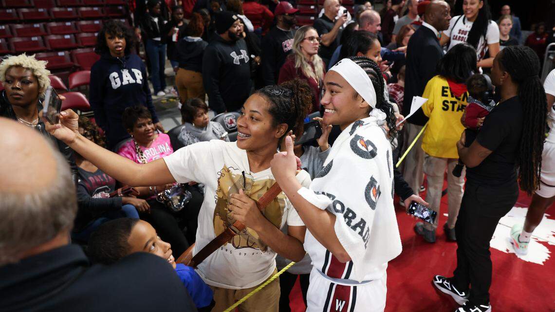 South Carolina guard Te-Hina Paopao (0) is greeted by fans following the Gamecocks’ game at Colonial Life Arena in Columbia on Saturday, December 16, 2023.