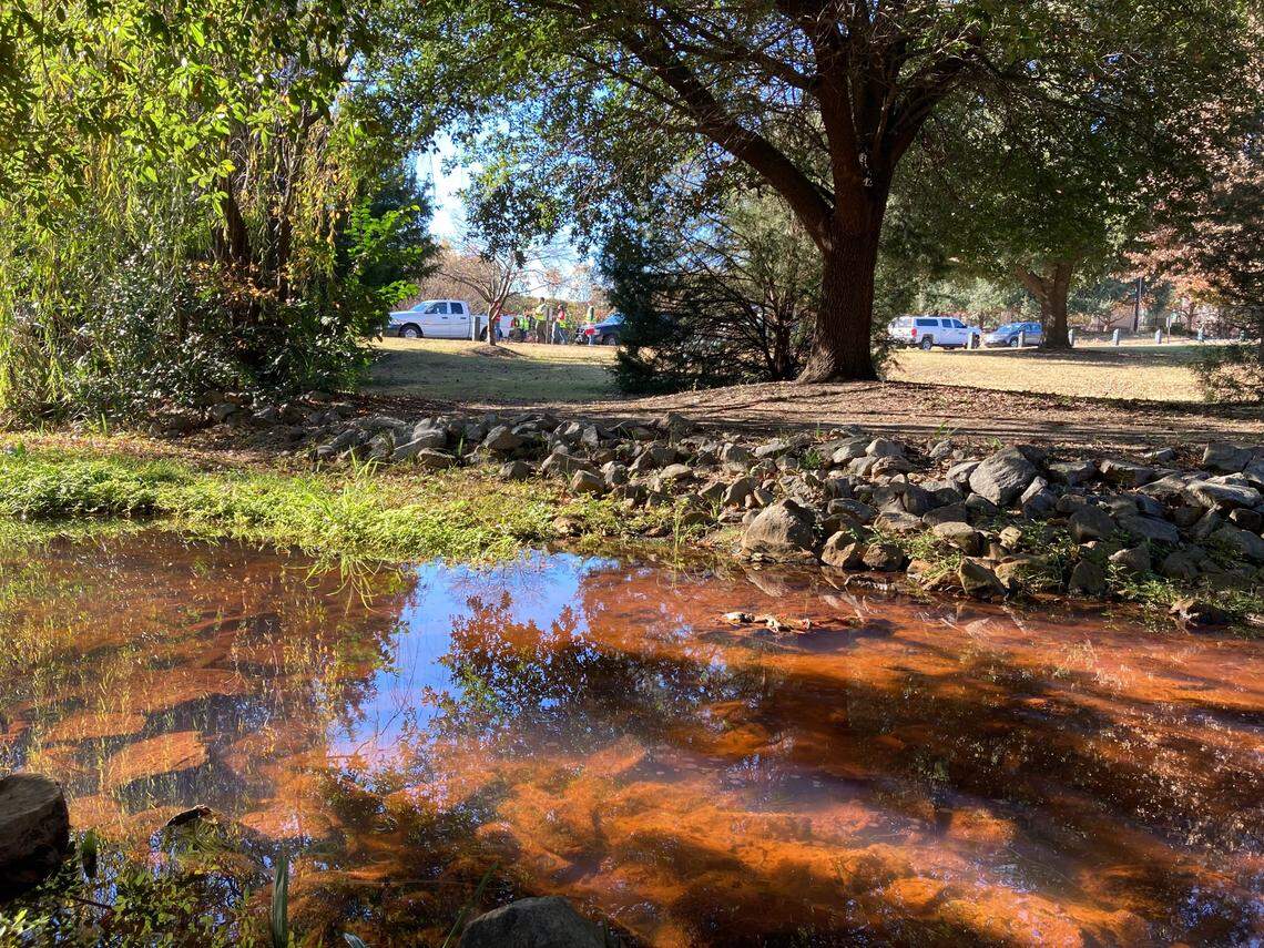 This creek in Columbia’s Memorial Park turned red after a diesel fuel spill Dec. 3, 2021.
