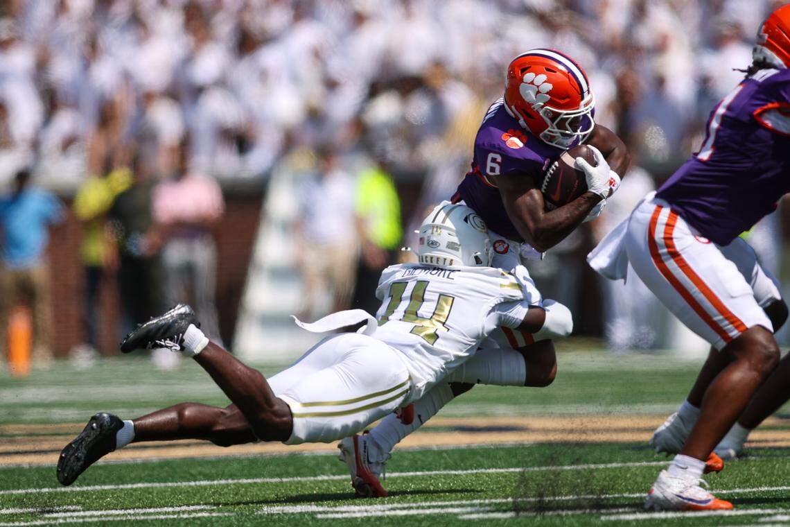 Clemson Tigers wide receiver Tyler Brown (6) is tackled by Georgia Tech Yellow Jackets defensive back Jy Gilmore (14) in the first quarter at Bobby Dodd Stadium at Hyundai Field.