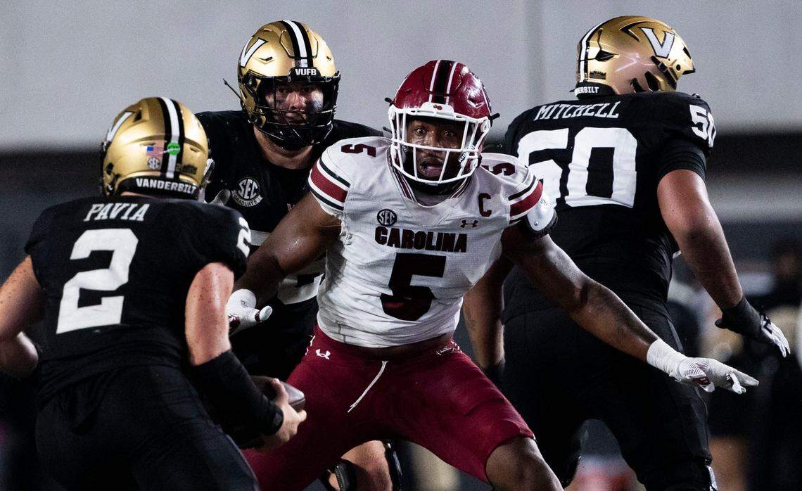 South Carolina Gamecocks edge Kyle Kennard (5) reacts as Vanderbilt Commodores quarterback Diego Pavia (2) protects the ball during the second half at FirstBank Stadium in Nashville.