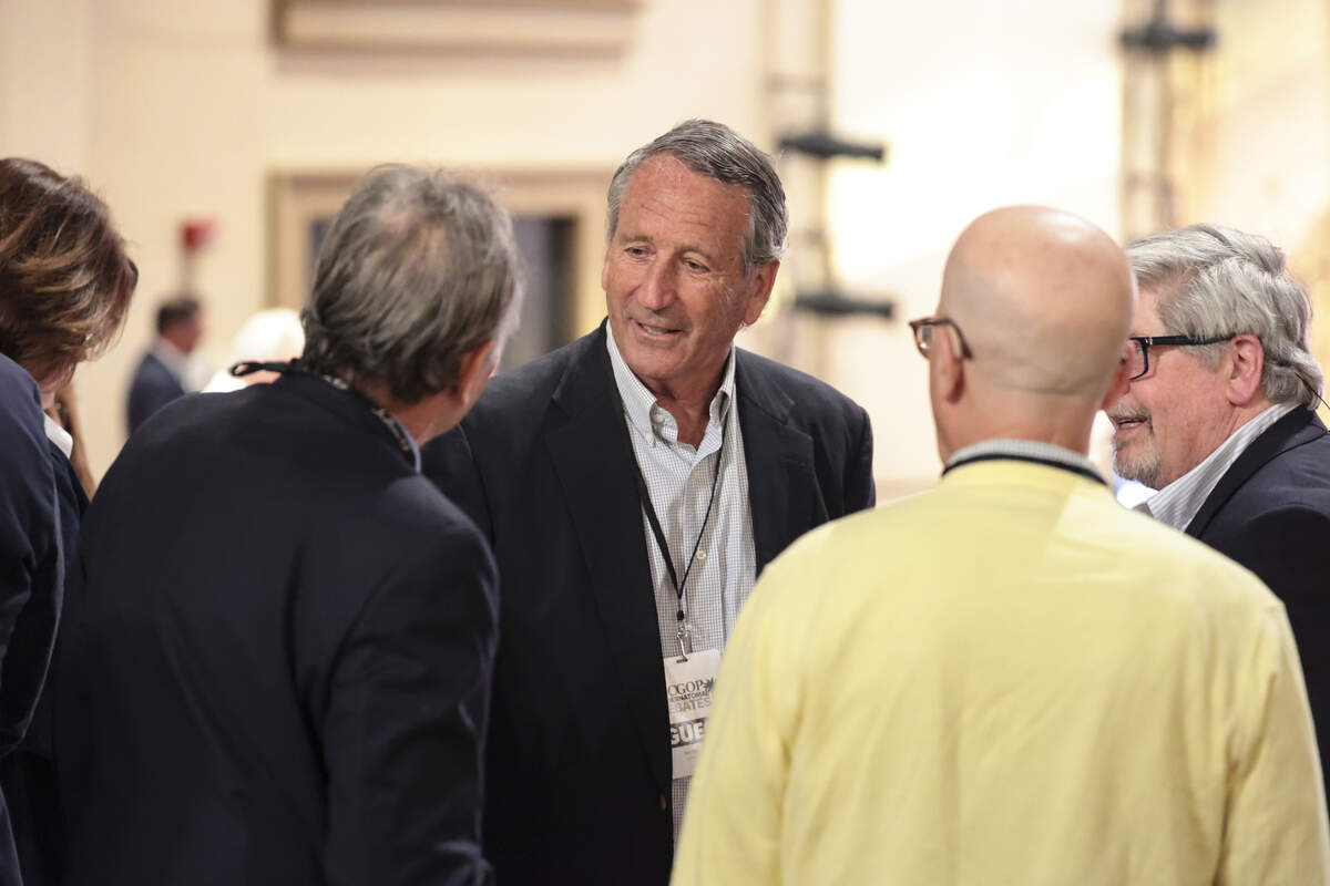 Former South Carolina Governor Mark Sanford chats at the Sottile Theater in Charleston on Tuesday, April 21, 2026. Sanford attended a GOP debate for candidates for governor.