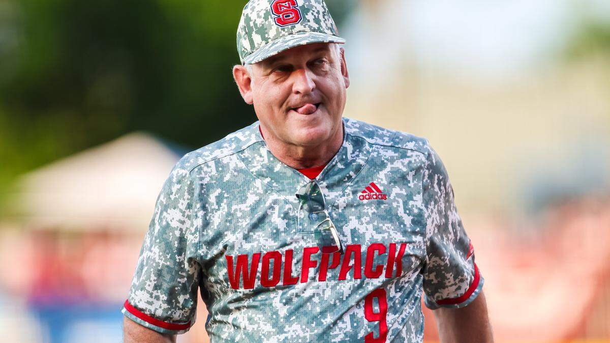 NC State Wolfpack head coach Elliott Avent walks off the field after pulling a pitcher against the South Carolina Gamecocks during their 2023 NCAA Columbia Regional game at Founders Park in Columbia, SC, Saturday, June 3, 2023.