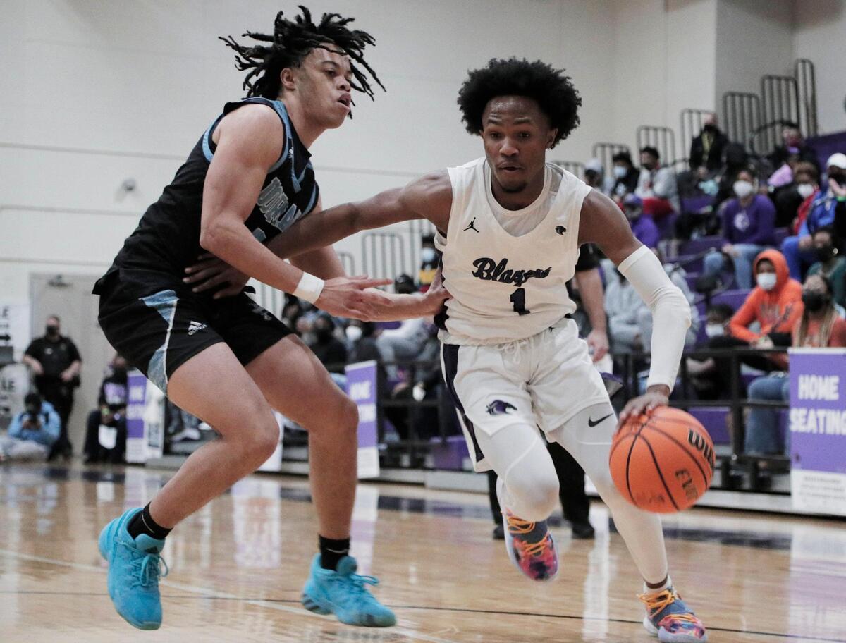Ridge View’s Jaylon Jeter 1 is guarded by Dorman’s Zay Foster 3 on Friday, February 26, 2021.