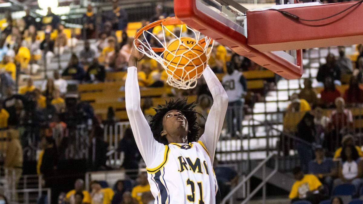 Brandon Crawford (31) of Irmo dunks in the final seconds of Irmo’s win over Lancaster in the SCHSL Class 4A State Championship at the USC Aiken Convocation Center on Thursday, March 2, 2023.