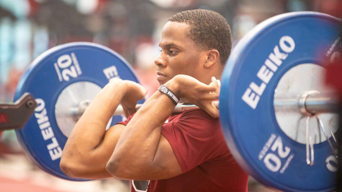 South Carolina Gamecocks running back MarShawn Lloyd lifts weights during a workout. Weightlifters have to watch out for an injury to the pectoralis major muscle.