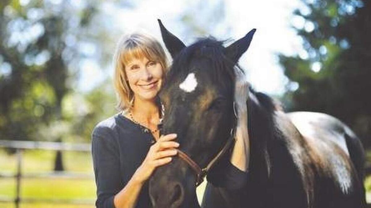 
Upstate actress and comedian Pam Stone at her Spartanburg County farm with one of her horses
