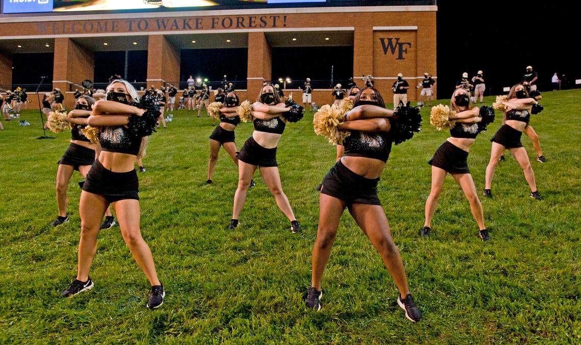 Wake Forest had its band and dance team members socially distanced, and wearing face coverings, on a hill in an endzone Saturday at Truist Field in Winston-Salem.