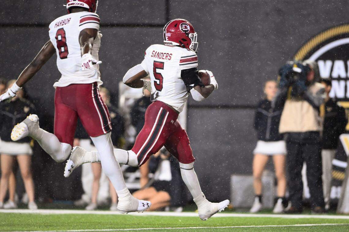 Nov 9, 2024; Nashville, Tennessee, USA; South Carolina Gamecocks running back Raheim Sanders (5) scores a touchdown against the Vanderbilt Commodores during the second half at FirstBank Stadium. Mandatory Credit: Steve Roberts-Imagn Images