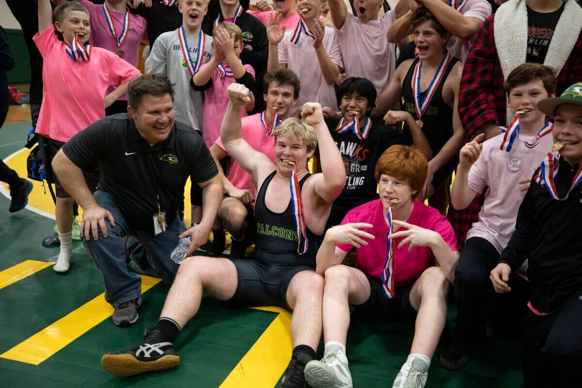 Members of the Ben Lippen wrestling team celebrate their win over the Hammond School in the SCISA 2022 Duals State Wrestling Tournament at Ben Lippen on Saturday, February 5, 2022.