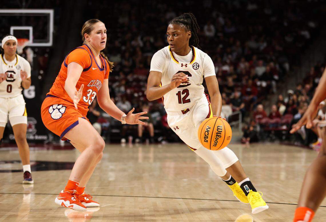 South Carolina guard MiLaysia Fulwiley (12) pushes to the basket as Clemson guard Danielle Rauch (33) defends during the first half of the Gamecocks’ game against the Tigers at Colonial Life Arena in Columbia on Thursday, November 16, 2023.