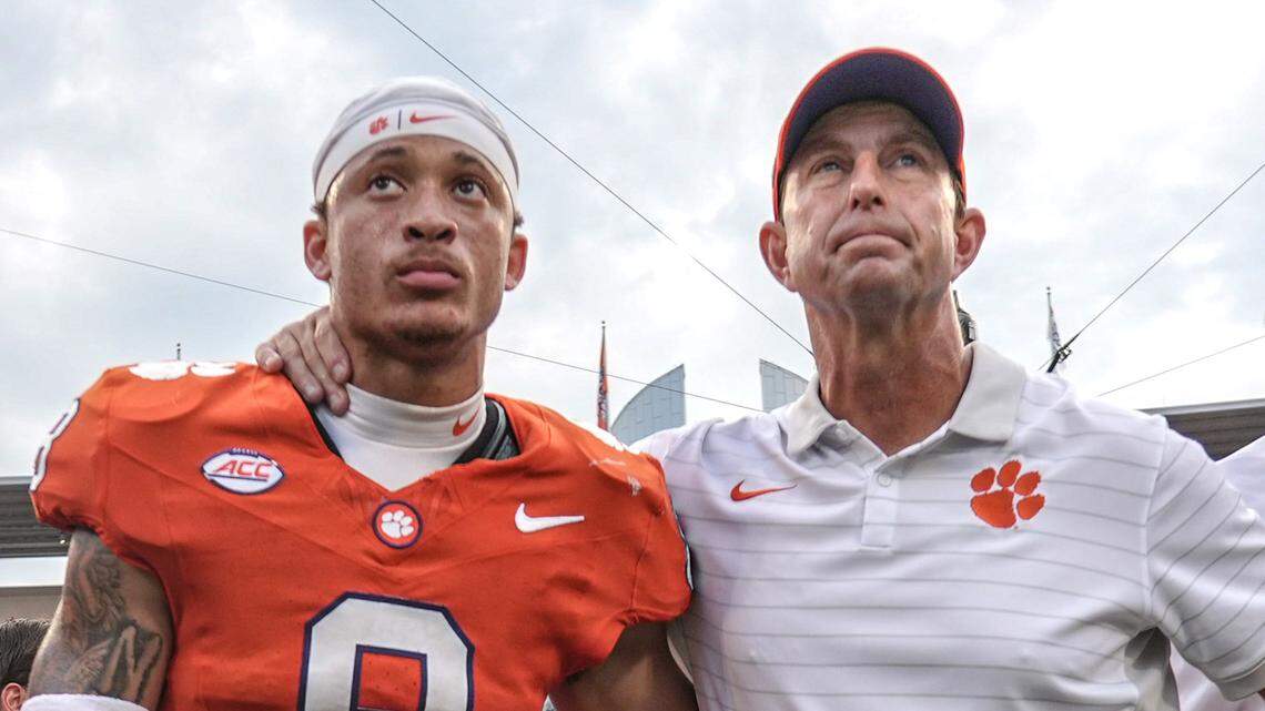 Sep 20, 2025; Clemson, South Carolina, USA; Clemson Tigers cornerback Avieon Terrell (8) stands with head coach Dabo Swinney after losing to the Syracuse Orange at Memorial Stadium. Mandatory Credit: Ken Ruinard/GREENVILLE NEWS-USA TODAY Network via Imagn Images