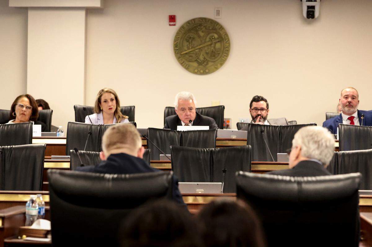Members of a senate finance sub-committee listen as South Carolina treasurer Curtis Loftis answers questions on Thursday, Feb. 27, 2025.