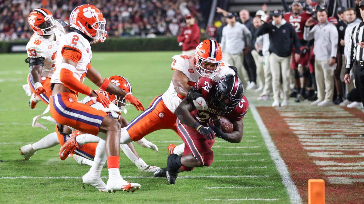 South Carolina running back Mario Anderson (24) gets brought down during the first half of South Carolina’s game against Clemson at Williams-Brice Stadium in Columbia on Saturday, November 25, 2023.