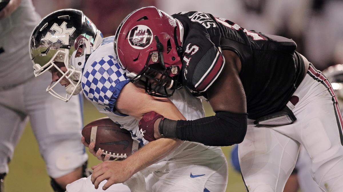 South Carolina football’s Aaron Sterling records a sack against Kentucky.