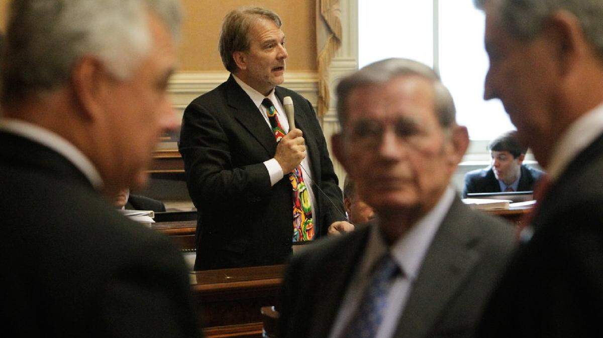 State Sen. Brad Hutto, D-Orangeburg, center, in the S.C. Senate chamber in 2013.