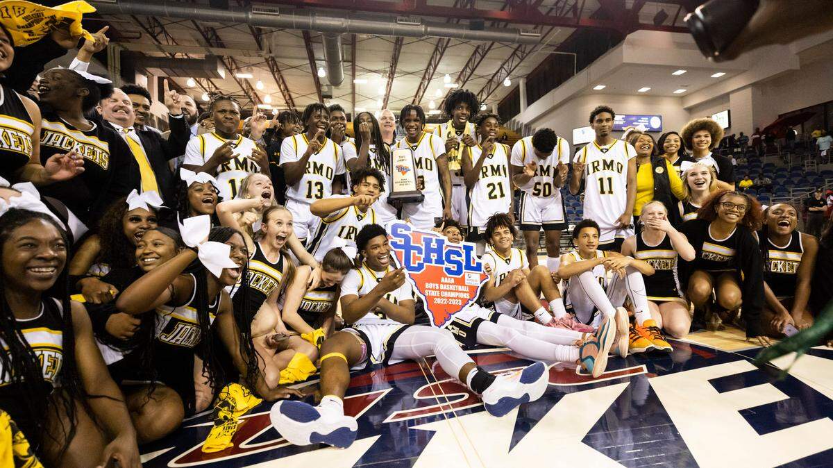 Players from Irmo celebrate after defeating Lancaster in the SCHSL Class 4A State Championship at the USC Aiken Convocation Center on Thursday, March 2, 2023.