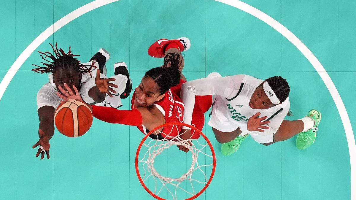 Aug 7, 2024; Paris, France; United States forward A’ja Wilson (9) goes for a rebound against Nigeria forward Murjanatu Musa (20) in the women’s basketball quarterfinals during the Paris 2024 Olympic Summer Games at Accor Arena. Mandatory Credit: Kyle Terada-USA TODAY Sports