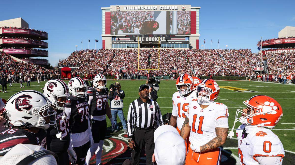 The coin toss is performed at midfield before South Carolina’s game against Clemson at Williams-Brice Stadium in Columbia on Saturday, November 29, 2025.