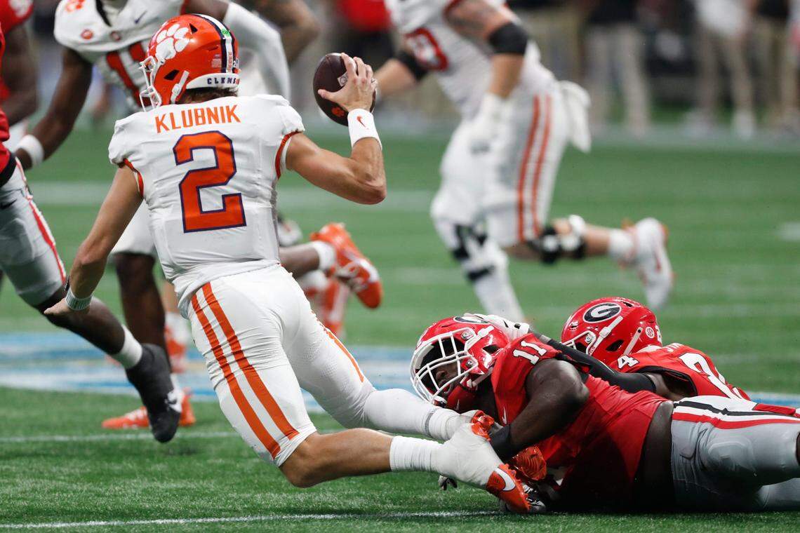Georgia linebacker Jalon Walker (11) sacks Clemson quarterback Cade Klubnik (2) during the second half of the NCAA Aflac Kickoff Game in Atlanta, on Saturday, Aug. 31, 2024.