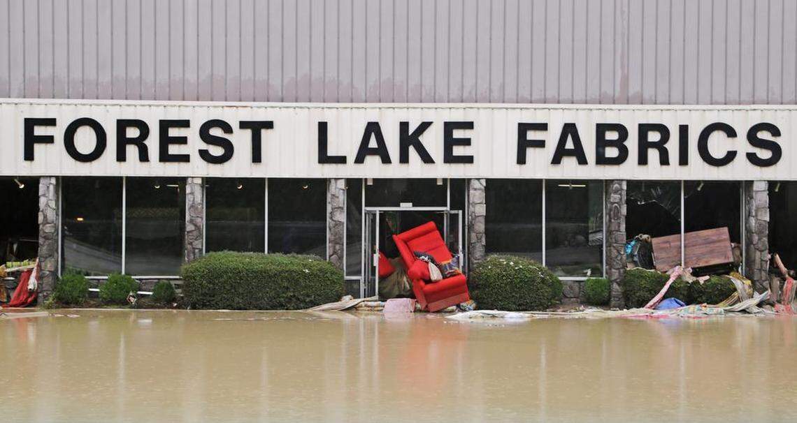 Flood damage was severe to businesses like Forest Lake Fabrics in Columbia, S.C.