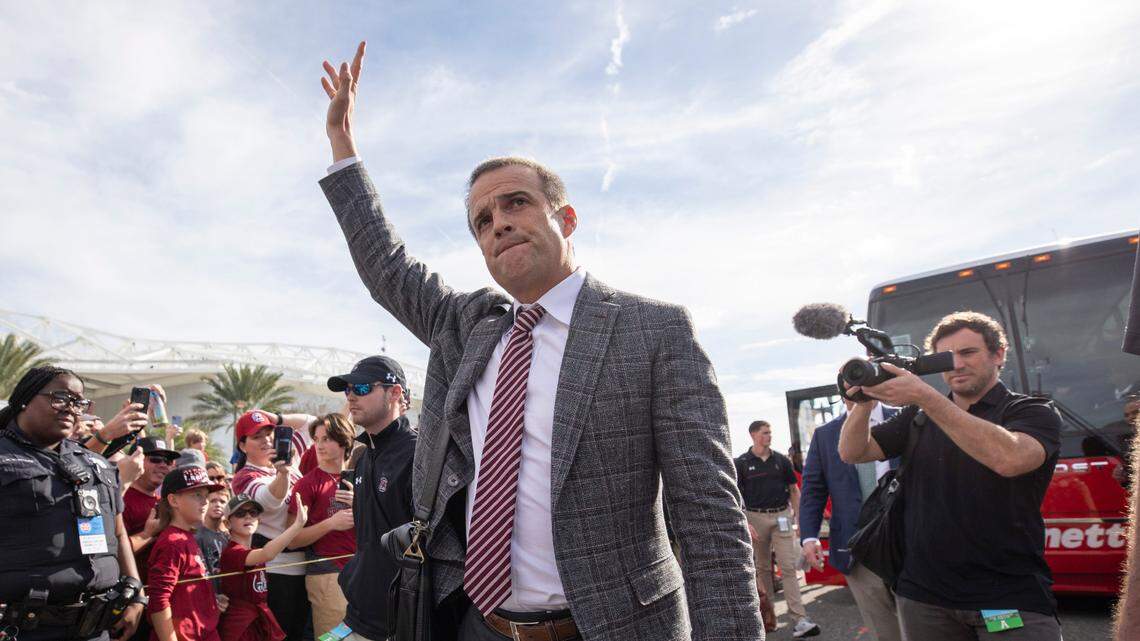South Carolina head coach Shane Beamer recognizes the crowd as he enters the stadium before the Gator Bowl against Notre Dame at TIAA Bank Field in Jacksonville, FL on Friday, Dec. 30, 2022.