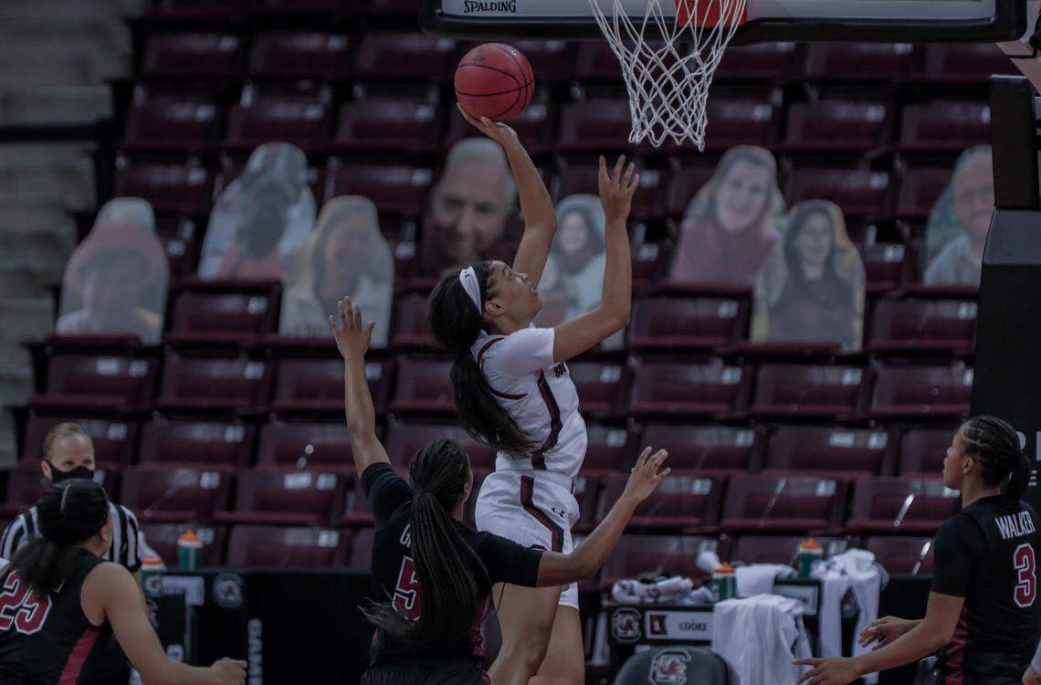 South Carolina Gamecocks forward Victaria Saxton (5) shoots as Temple guard Jada Graves (5) defends during the second half of action at the Colonial Life Arena.