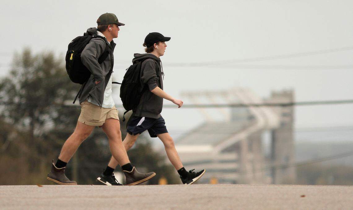 University of South Carolina students walk across south Main St. in Columbia, S.C. on March 23, 2022. (Travis Bell/STATEHOUSE CAROLINA)