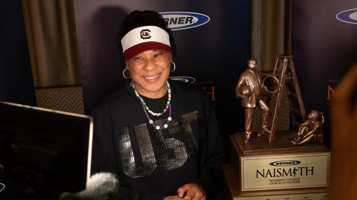Dawn Staley of South Carolina poses for a photo Wednesday after receiving the the award for the Naismith Women’s College Coach of the Year at the Cleveland Browns Stadium Key Bank Club.