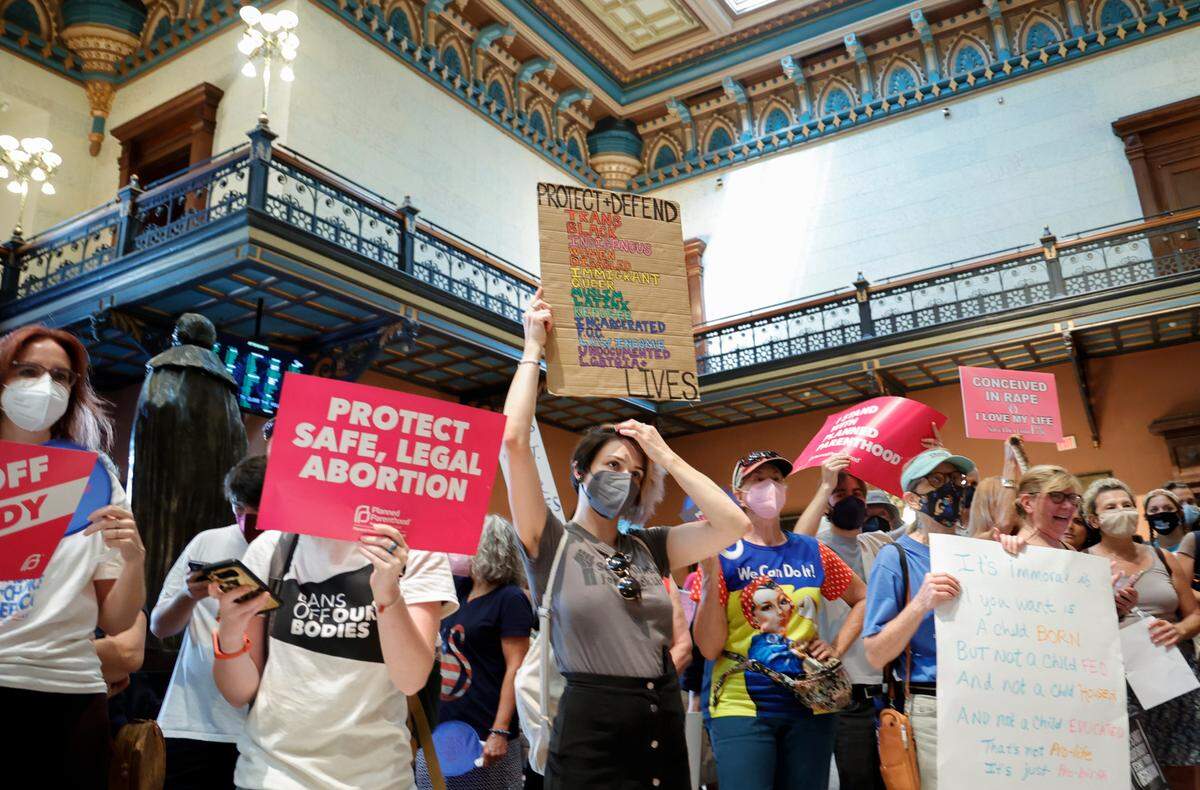 People rally inside the South Carolina Statehouse as members of the South Carolina House of Representatives prepare to vote on legislation related to an abortion ban in the state on Tuesday, Aug. 30, 2022.