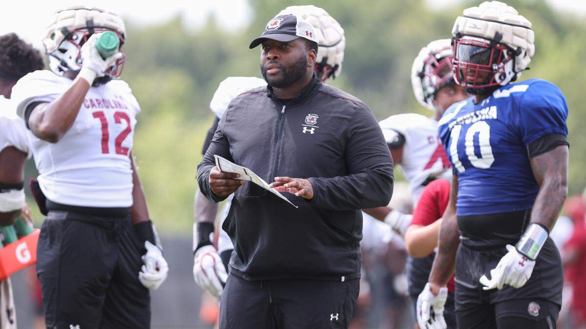 South Carolina assistant coach Sterling Lucas runs drills during practice in Columbia on Monday, August 7, 2023.