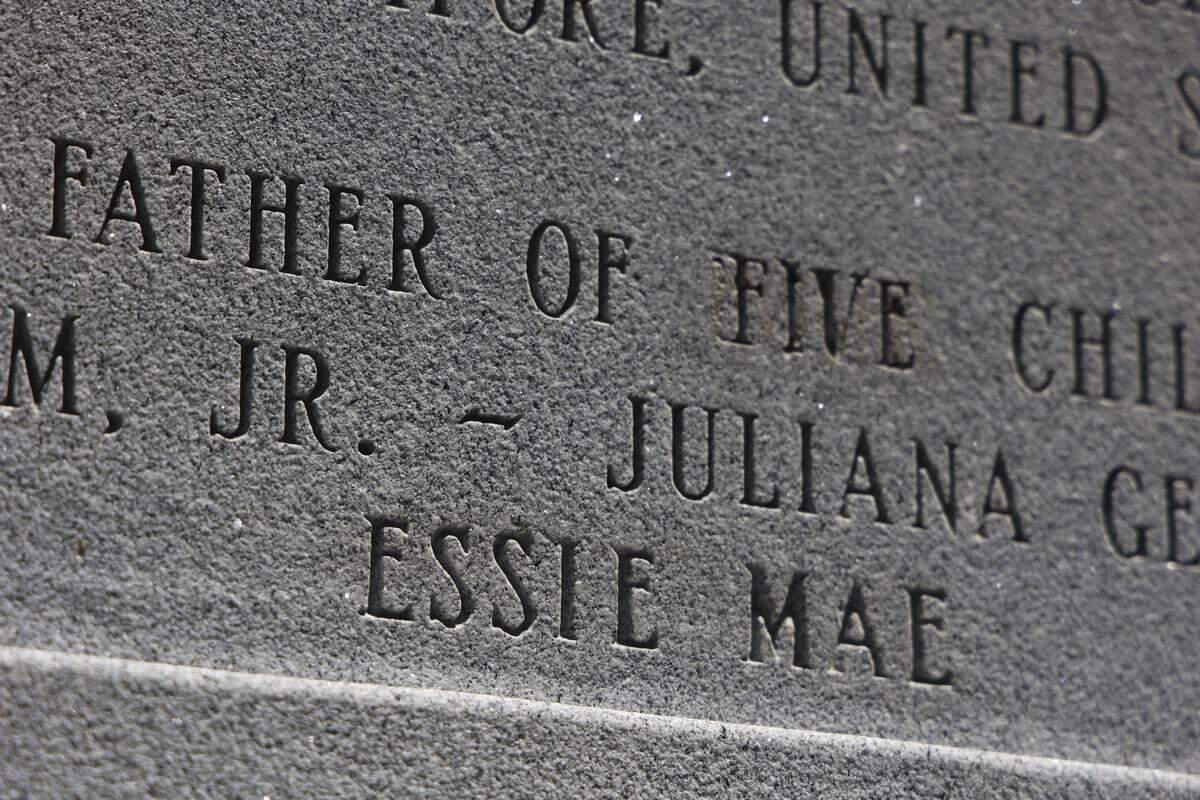 The statue honoring Strom Thurmond on the South Carolina State House grounds. The inscription on the statue was amended in 2005 to add the name of a fifth child, Essie Mae Washington-Williams.